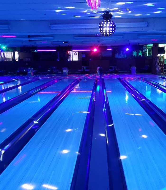 Glow bowling lanes with disco ball at Falls Bowl in Chippewa Falls WI.