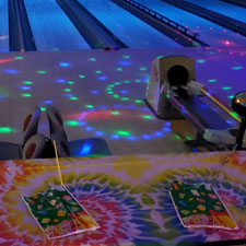 Ball returns during glow bowling at Falls Bowl in Chippewa Falls WI.